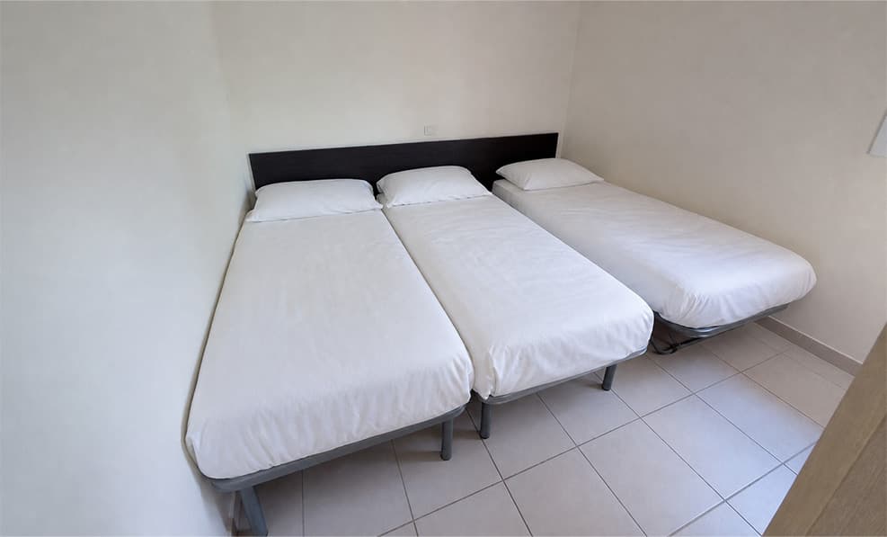 Chambre 3 lits simples