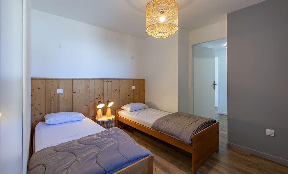 Chambre avec deux lits simples Résidence Les Balcons du Soleil 3P6S