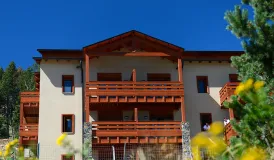 Résidence Les Chalets de l'Isard aux Angles - extérieur été